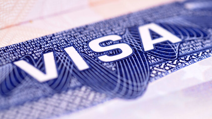 Closeup detail of a US visa document.